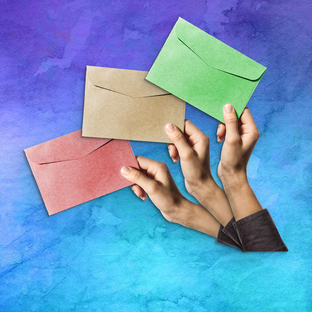 hands holding envelopes
